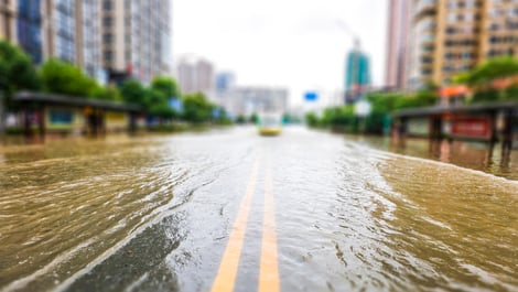 Photo of a flooding city street.