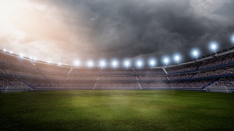 stadium with dark cloud overhead