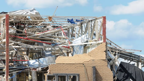 Building heavily damaged by a tornado.