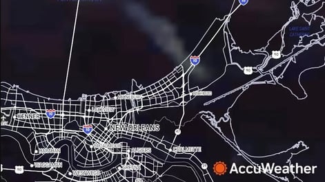 AccuWeather RealVue™ Satellite shows smoke streaming northwestward across I-10 northeast of New Orleans at 7:50 a.m. CST, approximately 3 hours after the accident occurred.