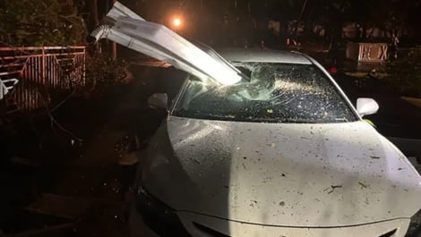 Gutter goes through the window of a car
